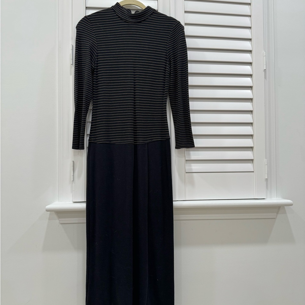 Black midi dress. Stripe top and slit black bottom.